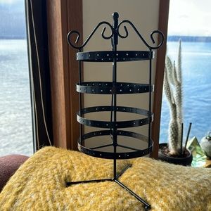 black metal rotating earring rack